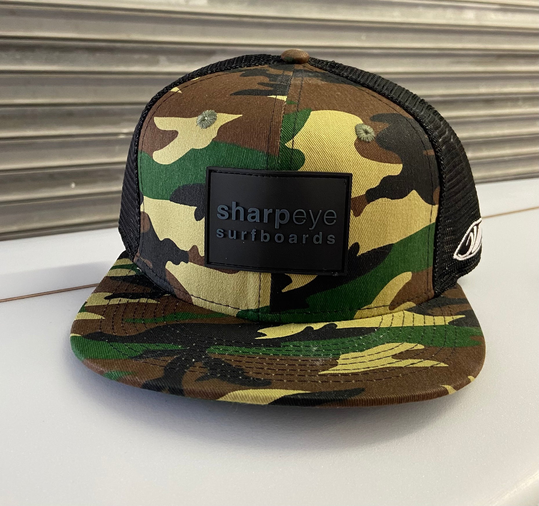 Sharp Eye Camo Trucker Hat