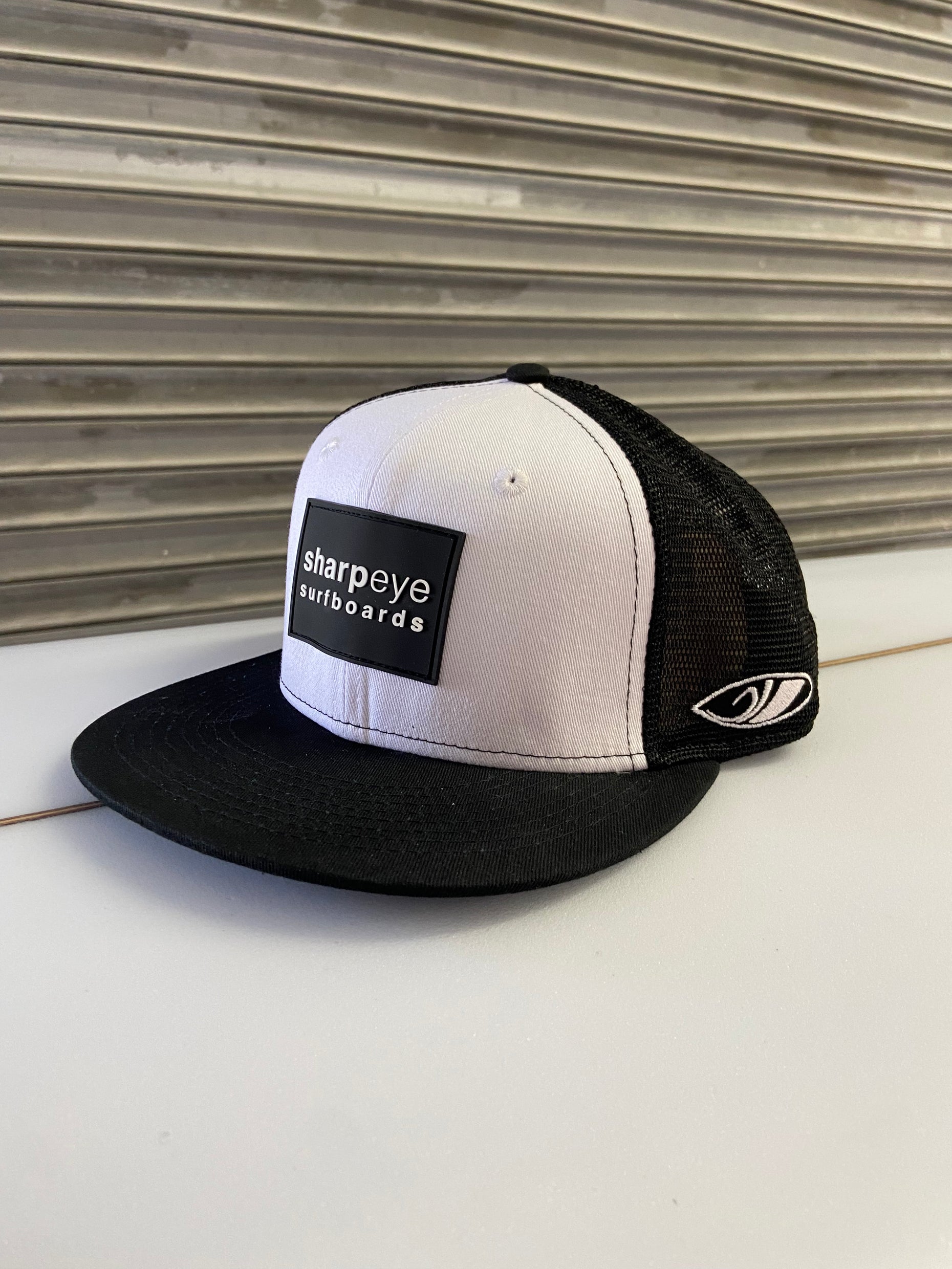 Sharp Eye Black and White trucker hat