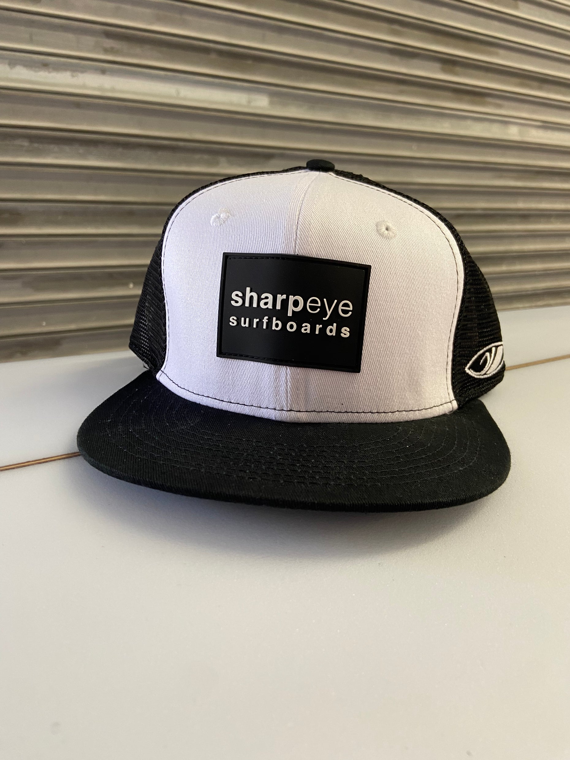 Sharp Eye Black and White trucker hat